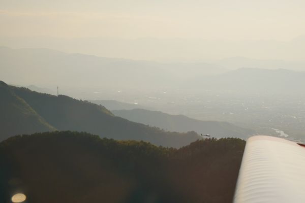 V horách s přeletáři vracejícími se domů na letiště v Naganu.